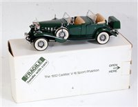 Lot 2604 - A Danbury Mint boxed 1:24 scale diecast group...