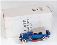 Lot 2606 - A Franklin Mint boxed 1:24 scale diecast group,...