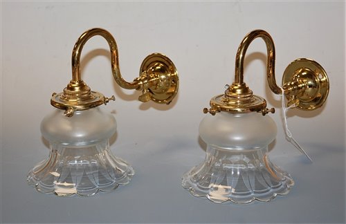Lot 4 - A pair of lacquered brass single sconce wall...