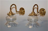 Lot 4 - A pair of lacquered brass single sconce wall...