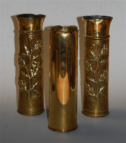 Lot 9 - A pair of World War One trench art shell case...