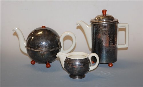 Lot 13 - A German porcelain three-piece tea service,...