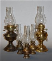 Lot 14 - An early 20th century brass pedestal oil lamp;...