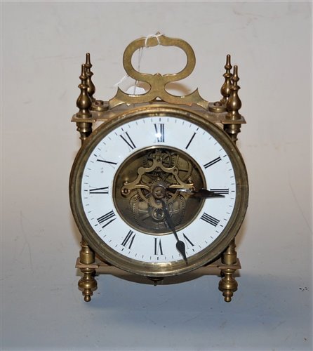 Lot 57 - An early 20th century brass cased mantel clock...