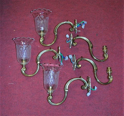 Lot 75 - A set of five lacquered brass single sconce...