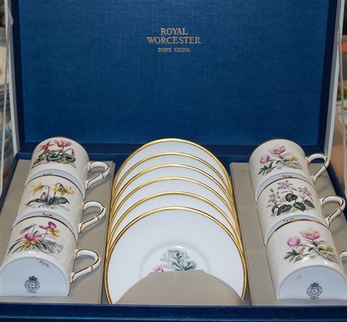 Lot 99 - A boxed set of six Royal Worcester coffee cans...