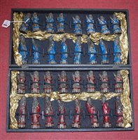 Lot 133 - A boxed set of modern Chinese resin figural...