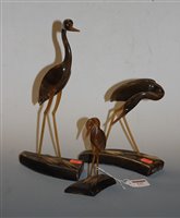 Lot 137 - A set of three carved horn figures of birds,...