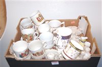 Lot 252 - A quantity of china commemorative mugs, a...