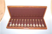 Lot 266 - A cased set of twelve modern silver and silver...