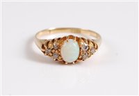 Lot 333 - An 18ct opal and diamond ring, the oval opal...