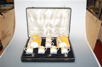 Lot 273 - A cased set of six Paragon china coffee cans...