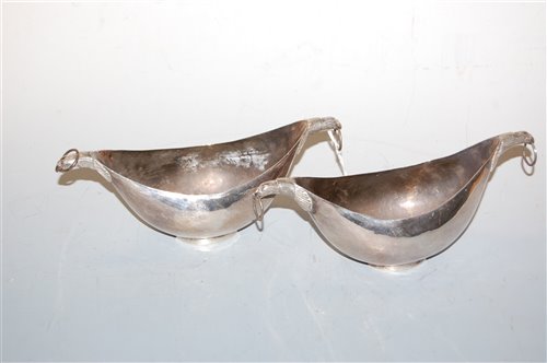 Lot 282 - A pair of white metal boat shaped dishes, the...