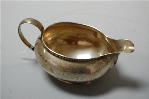 Lot 289 - A silver cream jug, 5oz, maker E&D Co,...