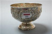 Lot 291 - An Edwardian silver and embossed footed rose...