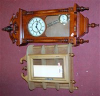 Lot 213 - A reproduction mahogany cased wall clock;...