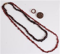 Lot 353 - Two garnet bead necklaces, 66cm and 52cm long,...