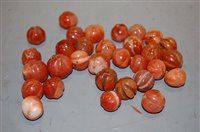 Lot 436 - A collection of hand-carved melon shaped pema...