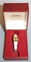 Lot 344 - A lady's Seiko gold plated cased and steel...