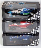 Lot 2651 - A Minichamps 1:18 scale boxed F1 diecast group...