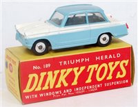 Lot 1975 - A Dinky Toys No. 189 Triumph Herald comprising...