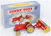 Lot 1982 - A Dinky Toys No. 27AK farm tractor and hay...