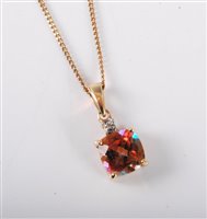 Lot 464 - A 14k pink mystic topaz pendant, 8mm wide,...