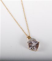 Lot 465 - A 9ct gold fancy cut mauve CZ pendant with...