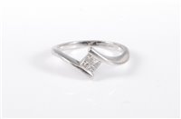 Lot 436 - A platinum diamond ring, the four princess cut...