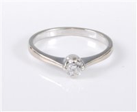 Lot 450 - A 9ct gold diamond solitaire ring, the round...