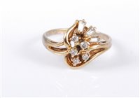 Lot 433 - A 9ct gold diamond spray ring, the asymmetric...