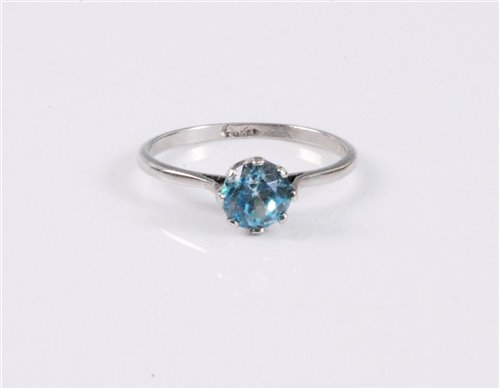 Lot 2592 - A blue zircon ring, the round pale blue zircon,...