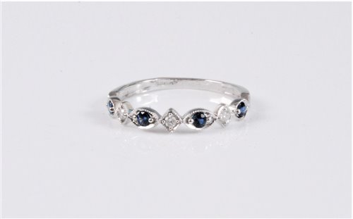 Lot 2598 - A 9ct sapphire and diamond half hoop eternity...