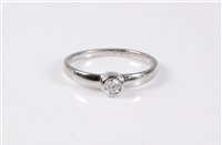 Lot 2642 - A platinum diamond solitaire ring, the round...