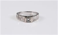Lot 2661 - An 18ct white gold diamond solitaire ring, the...