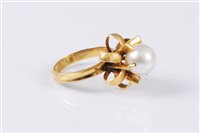 Lot 2622 - A continental cultured pearl dress ring, the...