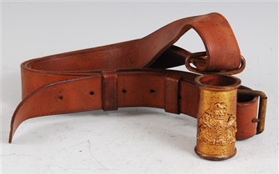Lot 123 - An early 20th century brown leather belt
