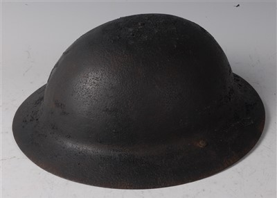 Lot 212 - A British Brodie pattern helmet