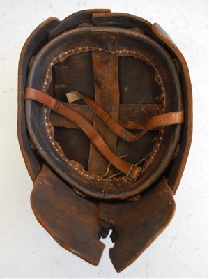 Lot 111 - A British 1916 pattern brown leather Tank Corps helmet