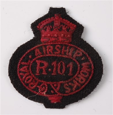 Lot 209 - A Royal Airship Works R101 cap badge.