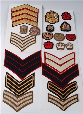 Lot 105 - A collection of various bullion badges and rank chevrons etc.