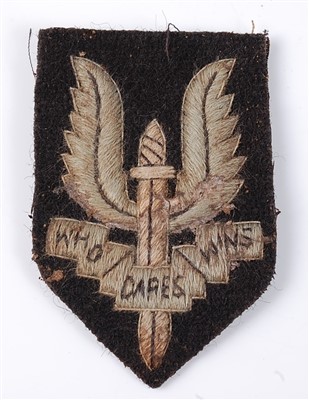 Lot 180 - An S.A.S. embroidered beret badge.