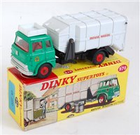 Lot 1964 - A Dinky Toys No. 978 refuse wagon, comprising...