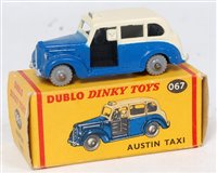 Lot 2023 - A Dublo Dinky Toys No. 067 Austin taxi...