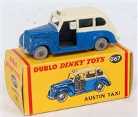 Lot 2024 - A Dublo Dinky Toys No. 067 Austin taxi...