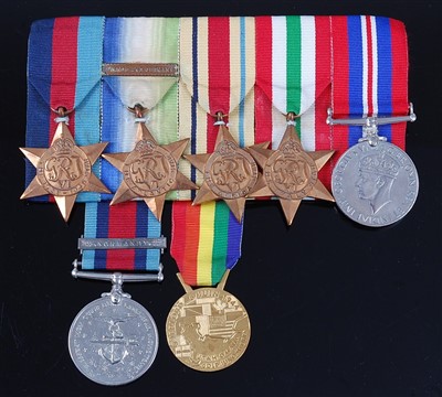 Lot 244 - A WW II group of seven medals