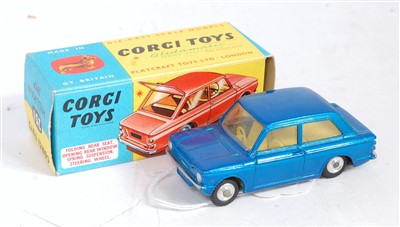 Lot 1621 - A Corgi Toys No. 251 Hillman Imp comprising...