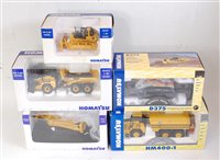 Lot 2748 - A Komatsu 1:50 scale boxed diecast group,...