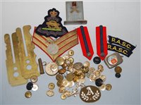 Lot 300 - A box of miscellaneous militaria, to include...