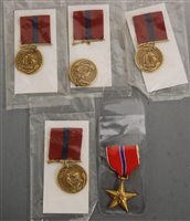 Lot 332 - Four United States Marine Corps good conduct...